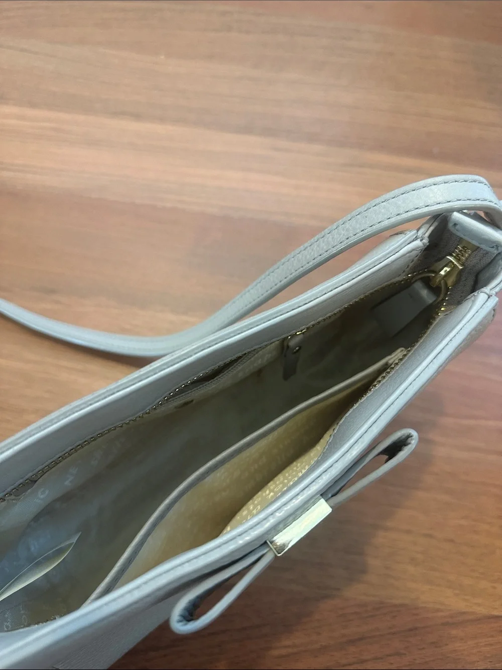 kate spade Pebble Leather Crossbody in Light Gray with Bow Accent